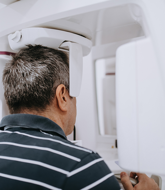 Dental patient getting a scan of his mouth and jaws