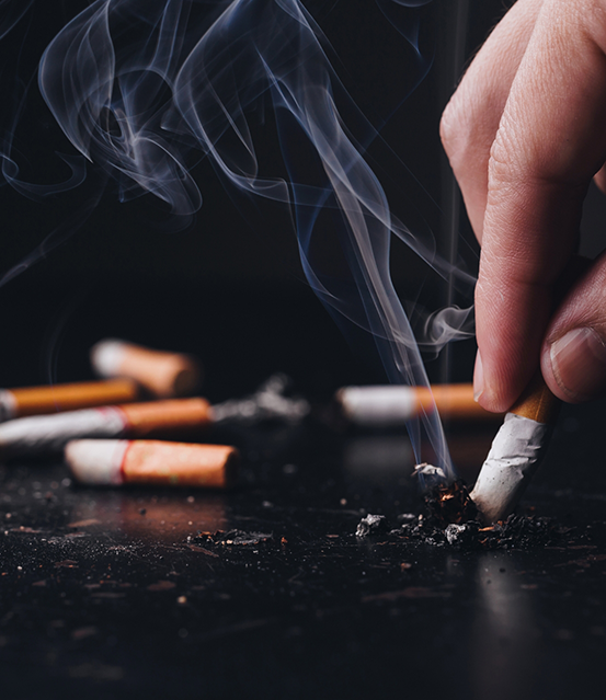 Person putting out a cigarette