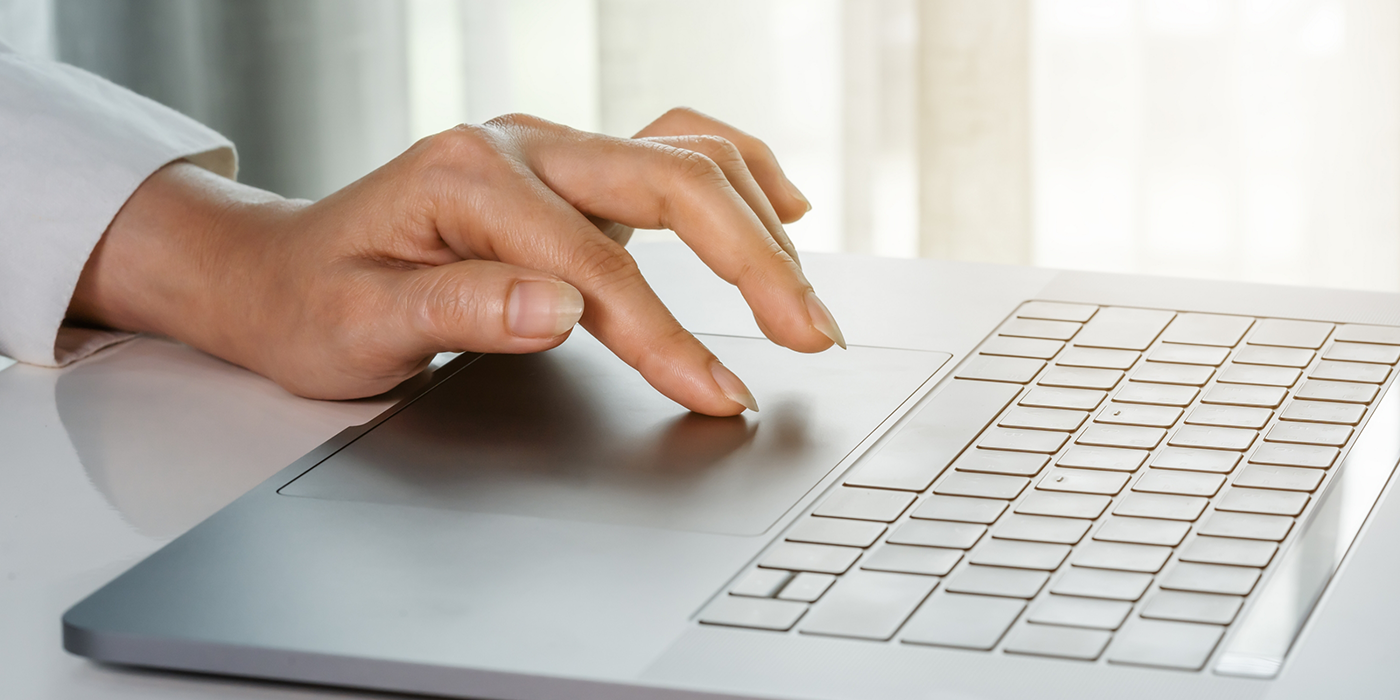 Person typing on a laptop
