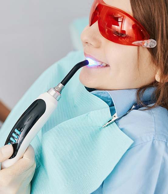 Dental patient getting dental bonding