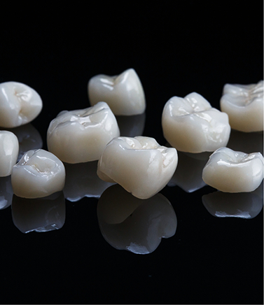 Several tooth colored dental crowns