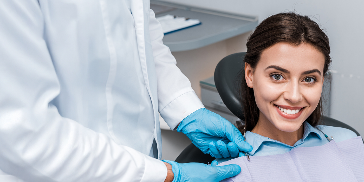 Woman smiling right before her dental cleaning in Fort Worth