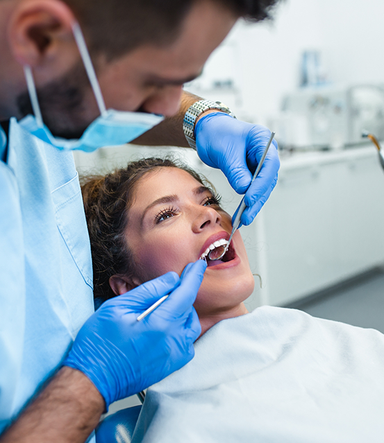 Woman getting a dental exam