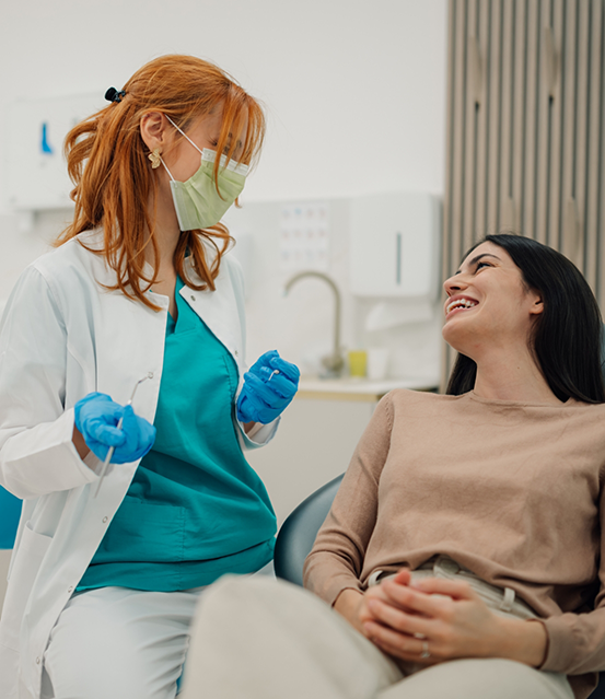 Woman talking to her dentist