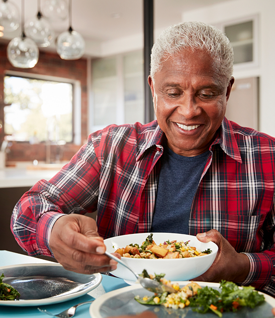 Senior eating a salad