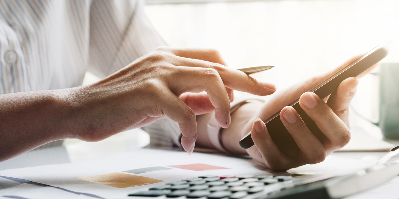 Person filling out dental insurance paperwork