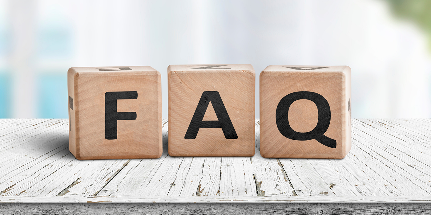 Wooden block letters spelling FAQ