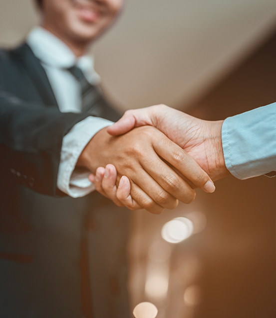 Two people shaking hands