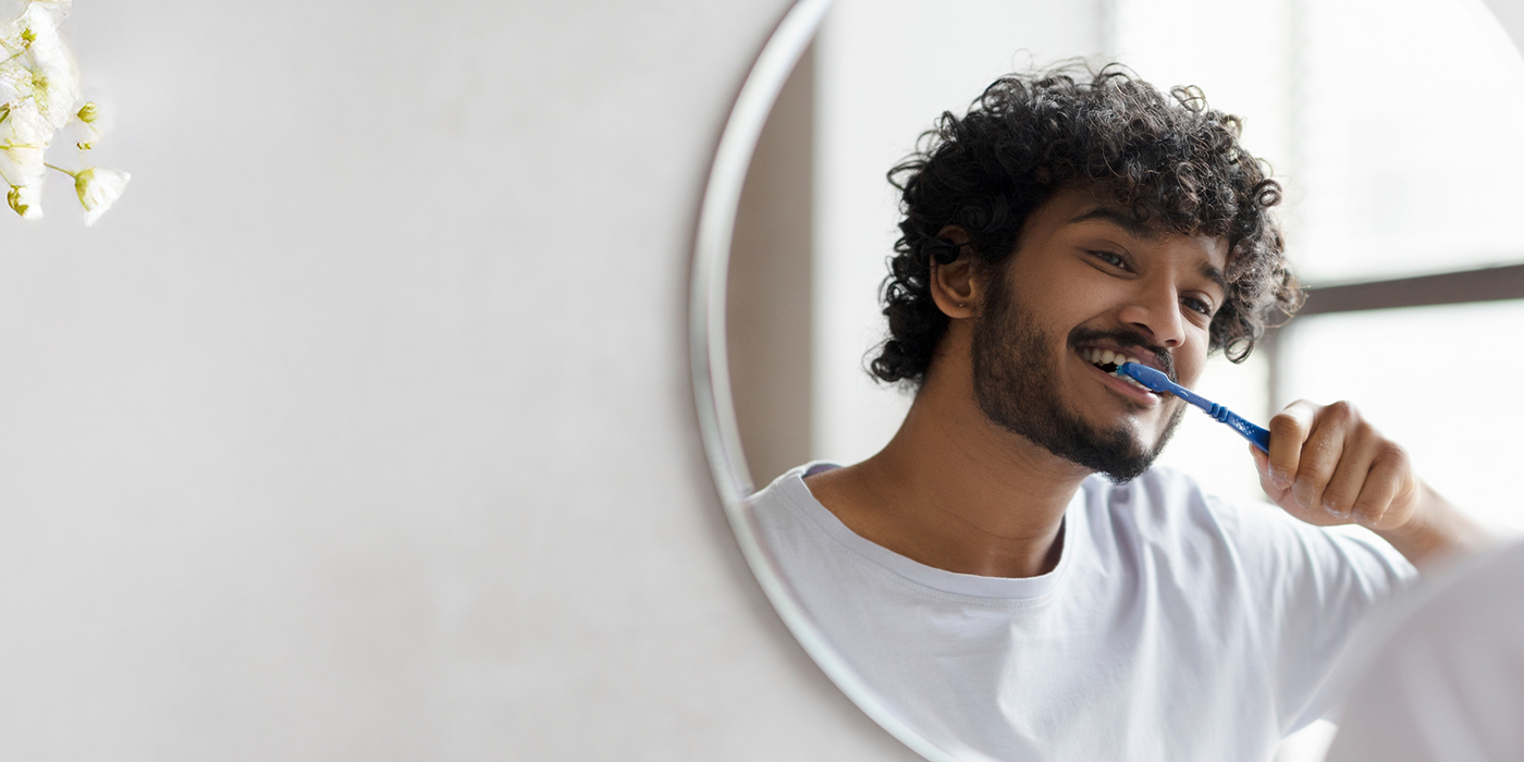 Man brushing his teeth