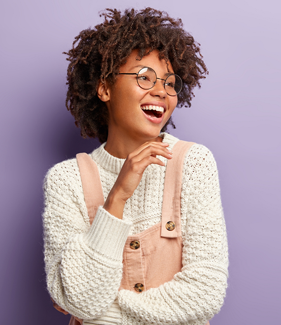 Smiling woman in a white sweater