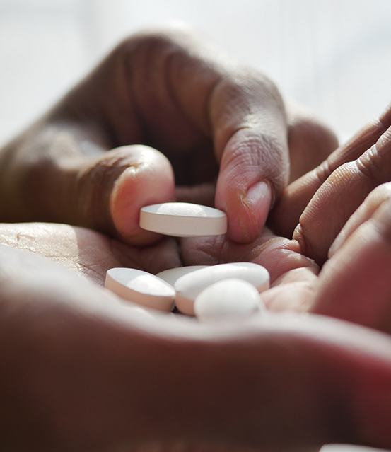 Person taking a pill