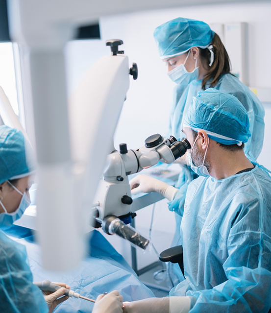 Dental team performing wisdom tooth extractions